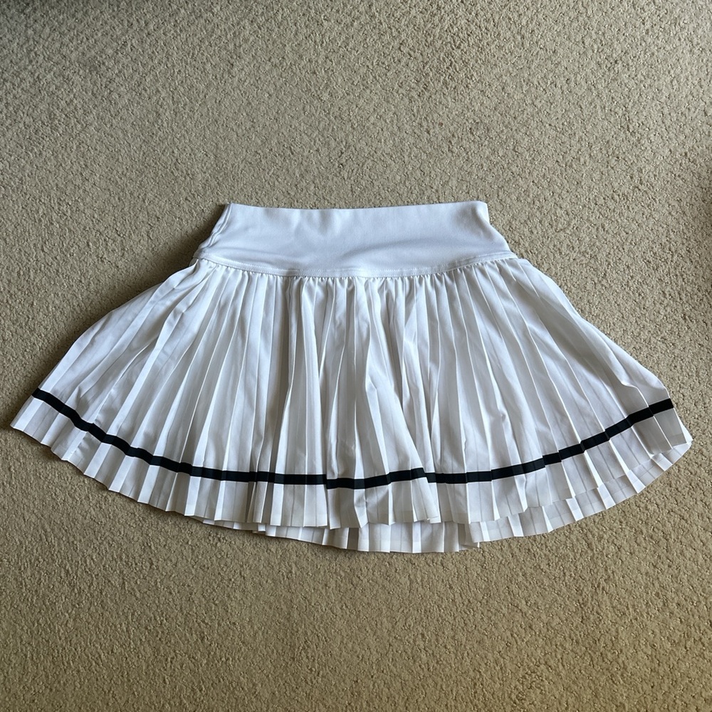 White Pleated Skirt with Black Trim
